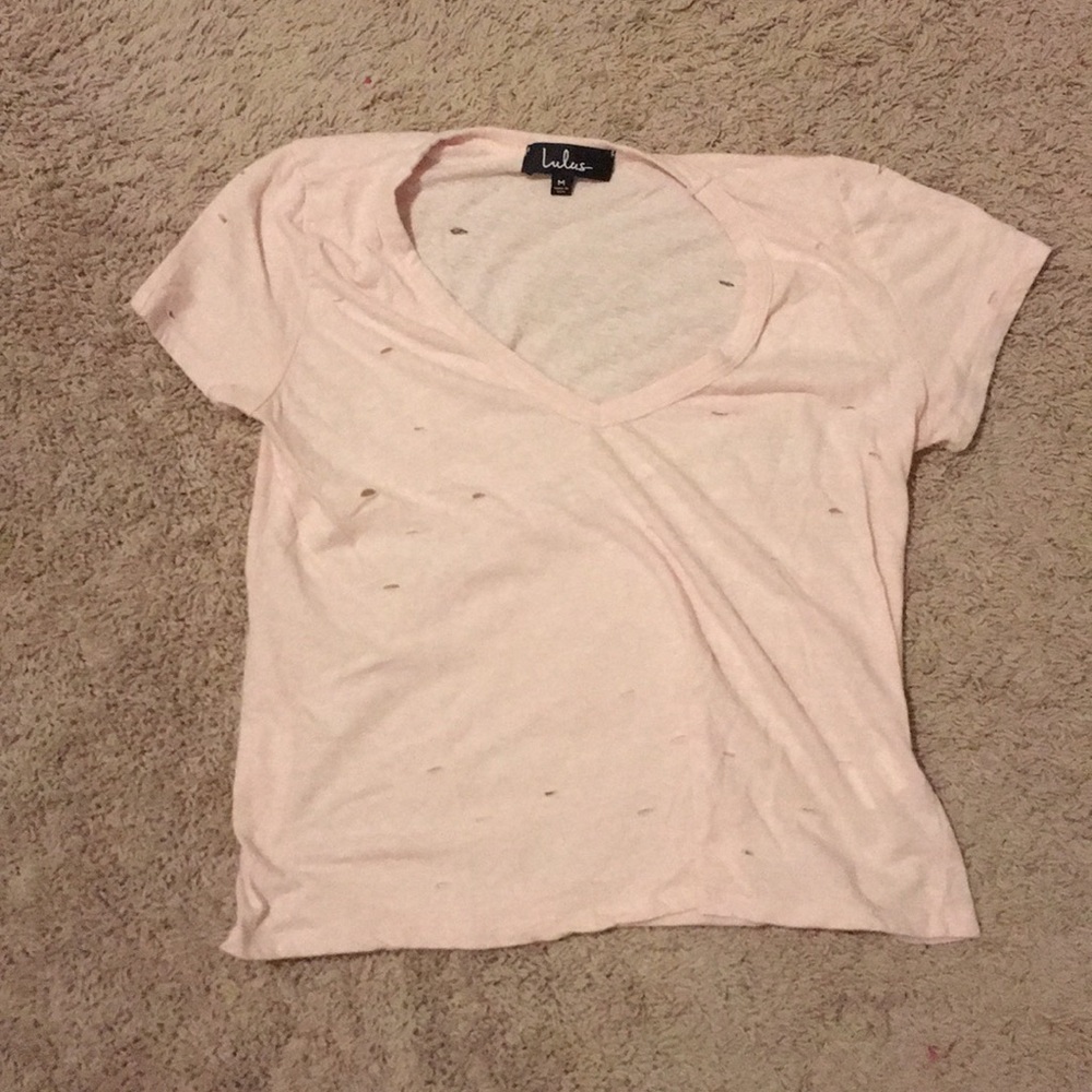 Lulu’s pink hole shirt. Barely worn.
